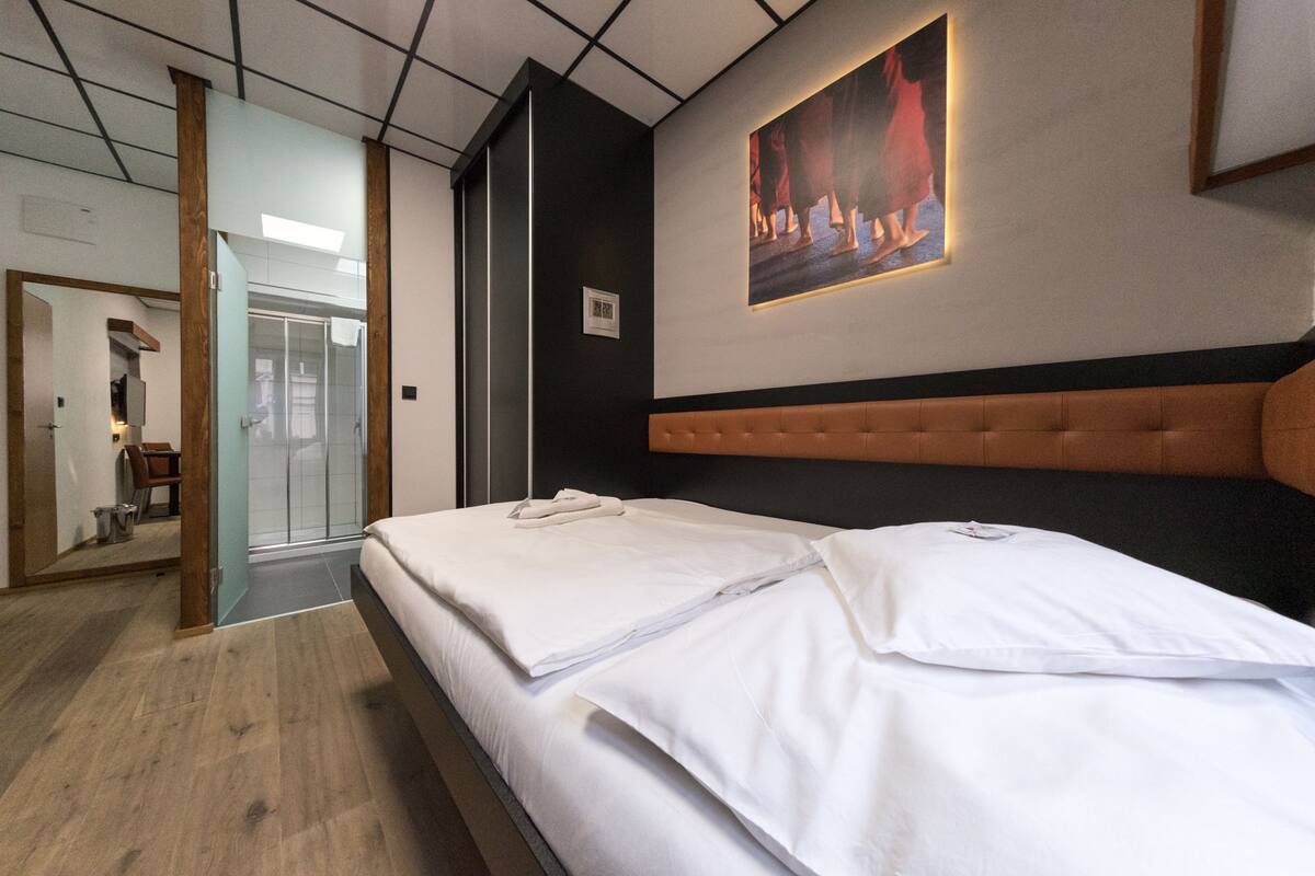Desk, blackout curtains, free WiFi, bed sheets