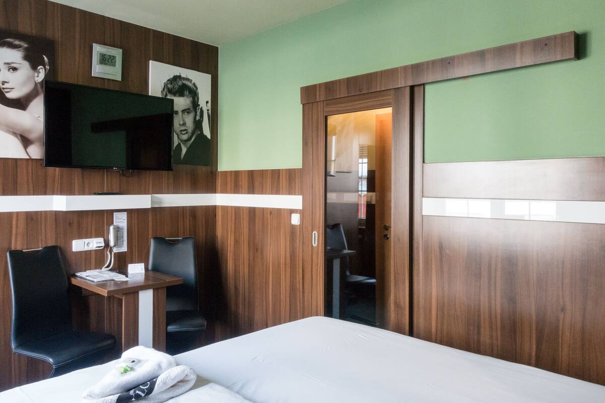 Desk, blackout curtains, free WiFi, bed sheets