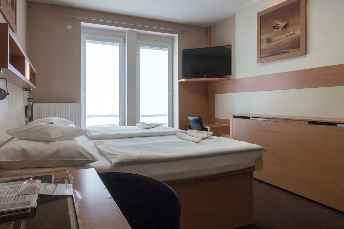 Desk, blackout curtains, free WiFi, bed sheets
