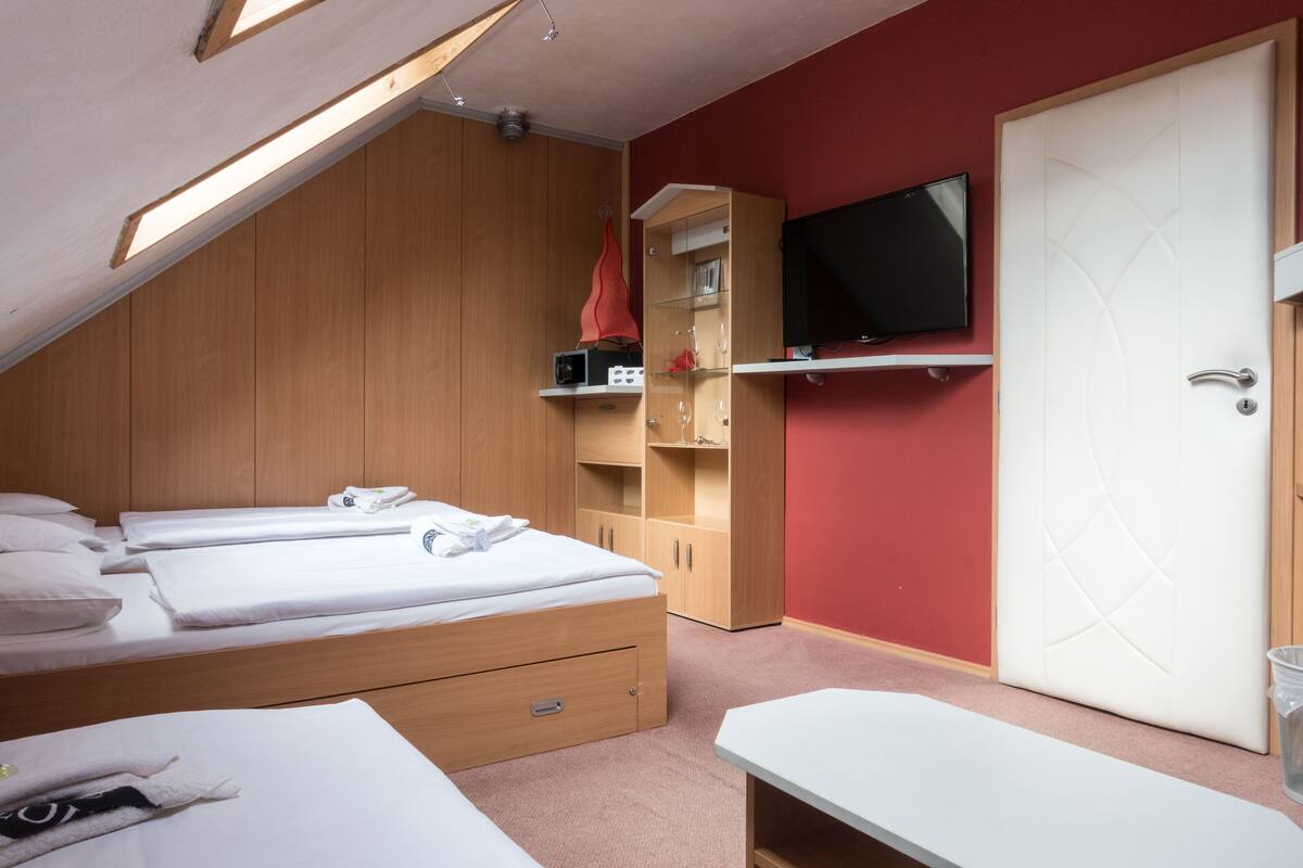 Desk, blackout curtains, free WiFi, bed sheets