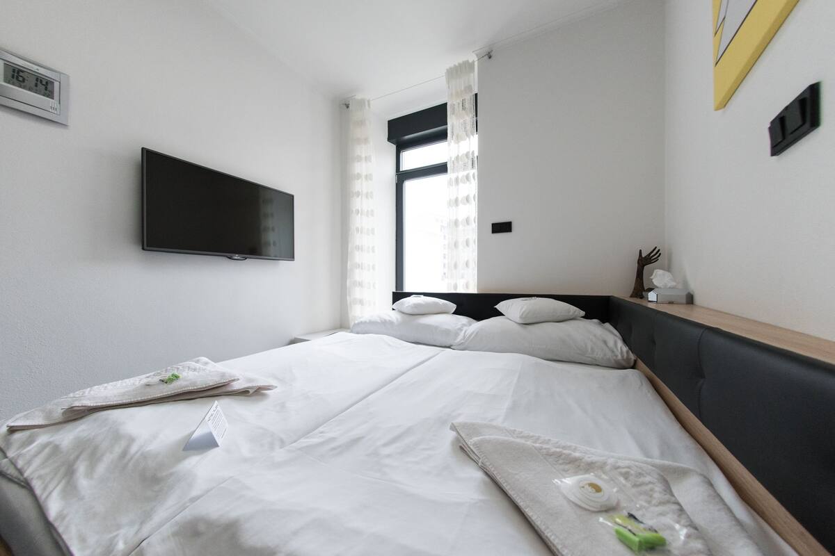 Desk, blackout curtains, free WiFi, bed sheets
