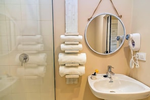 Shower, free toiletries, hair dryer, towels