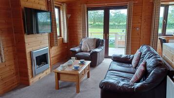 Comfort-Apartment, eigenes Bad, Gartenblick | Lounge