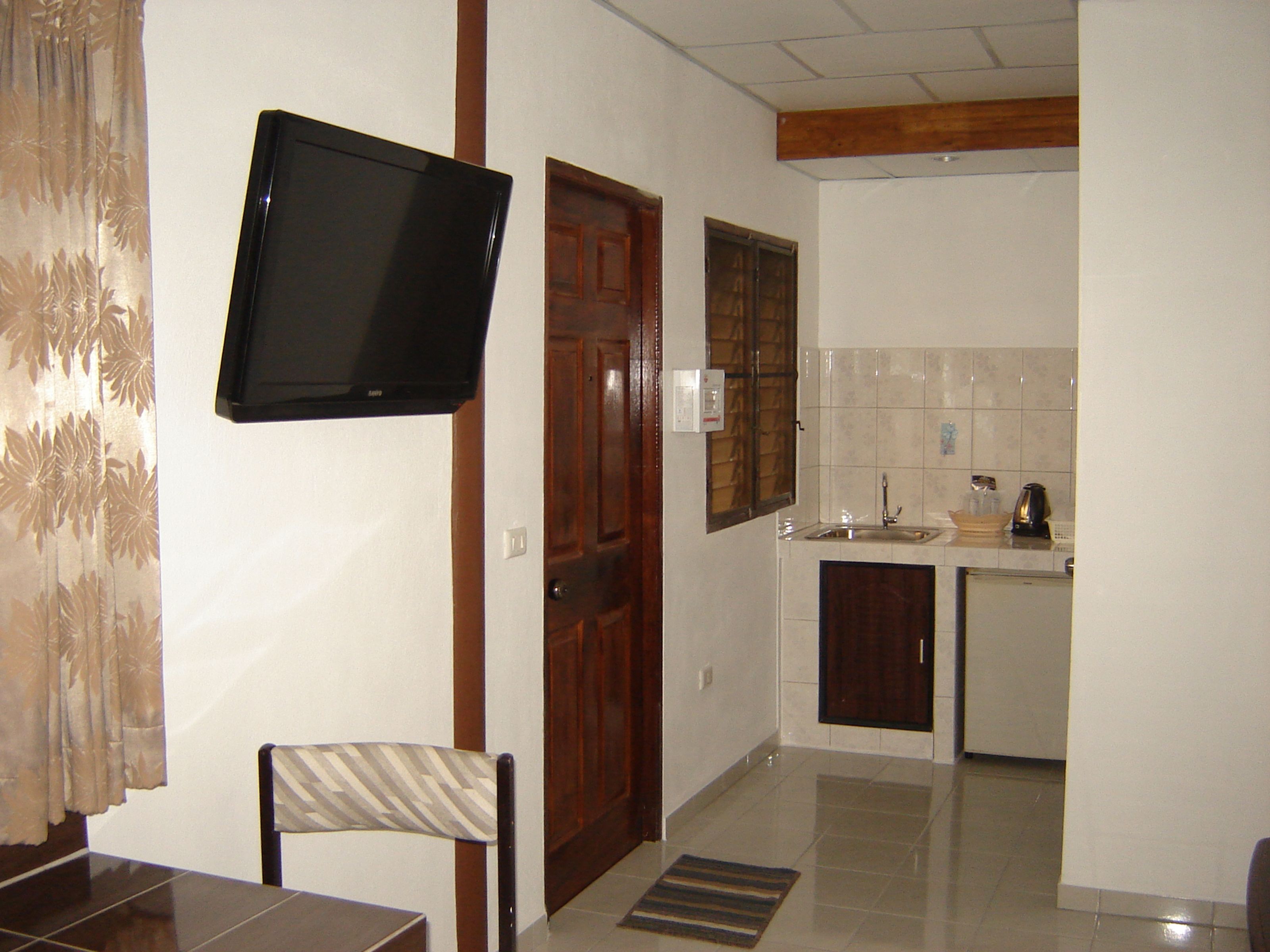 Air-conditioned Room | Private kitchenette | Fridge, electric kettle