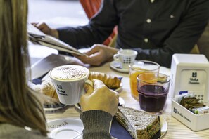 Daily local cuisine breakfast (EUR 3 per person) - Colibrì Prestige Rooms (Cagliari)