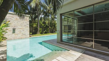 Outdoor pool, pool umbrellas, pool loungers