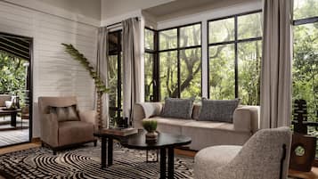 Villa, 2 Bedrooms (Canopy) | Living area | TV, fireplace