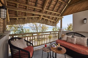 Deluxe Room, Beachfront | Terrace/patio