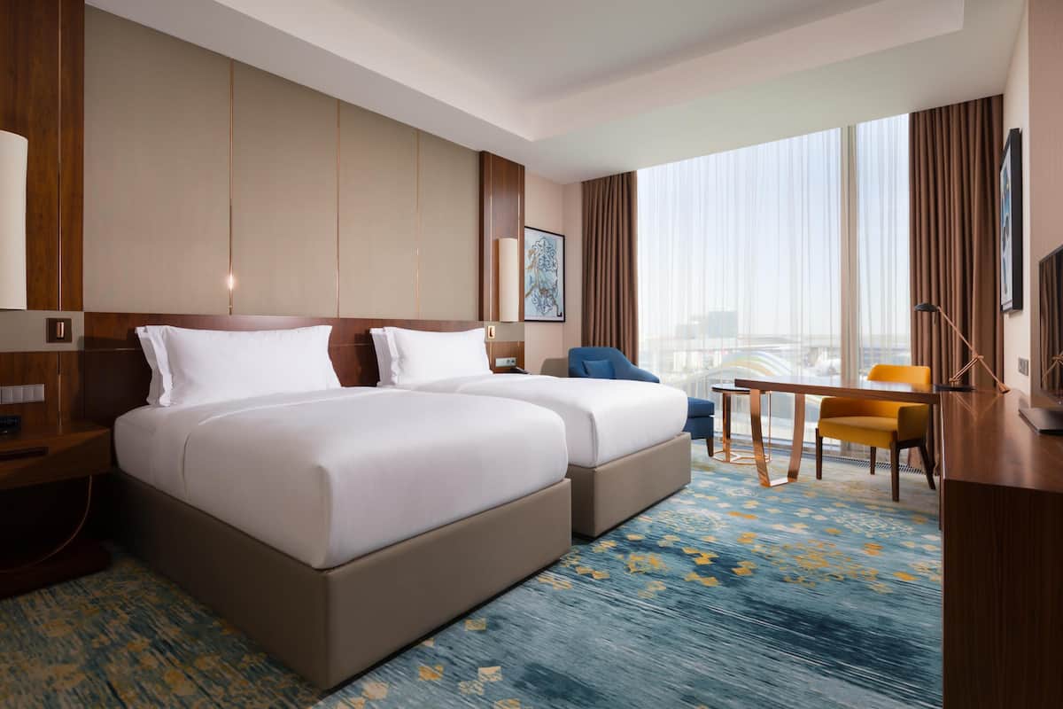 Premium bedding, memory foam beds, minibar, in-room safe