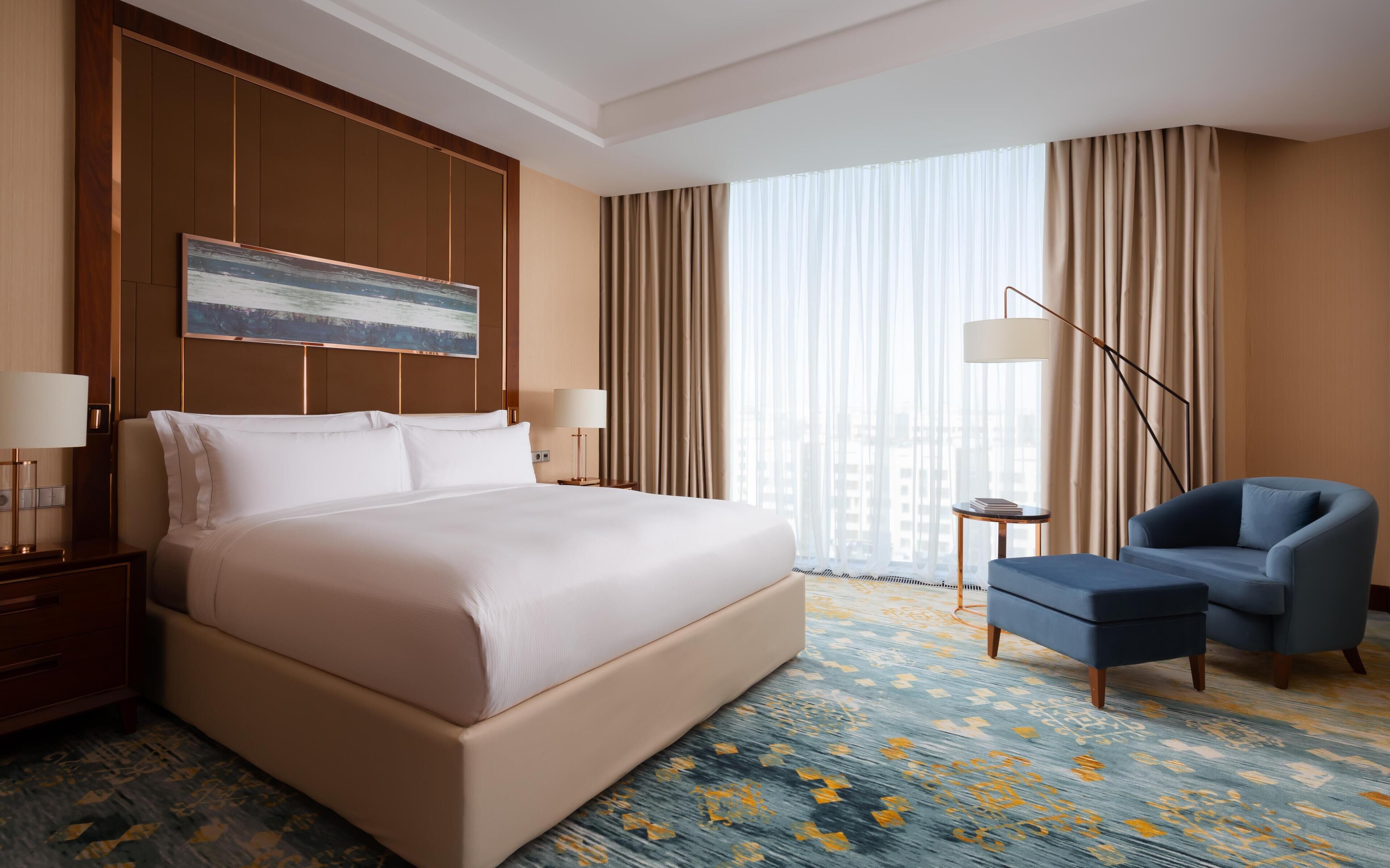 Executive Suite, 1 King Bed | Living area | 40-inch Smart TV with digital channels, TV, MP3 dock