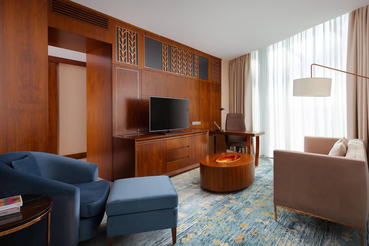 Suite, 1 Bedroom | Living area | 40-inch Smart TV with digital channels, TV, MP3 dock