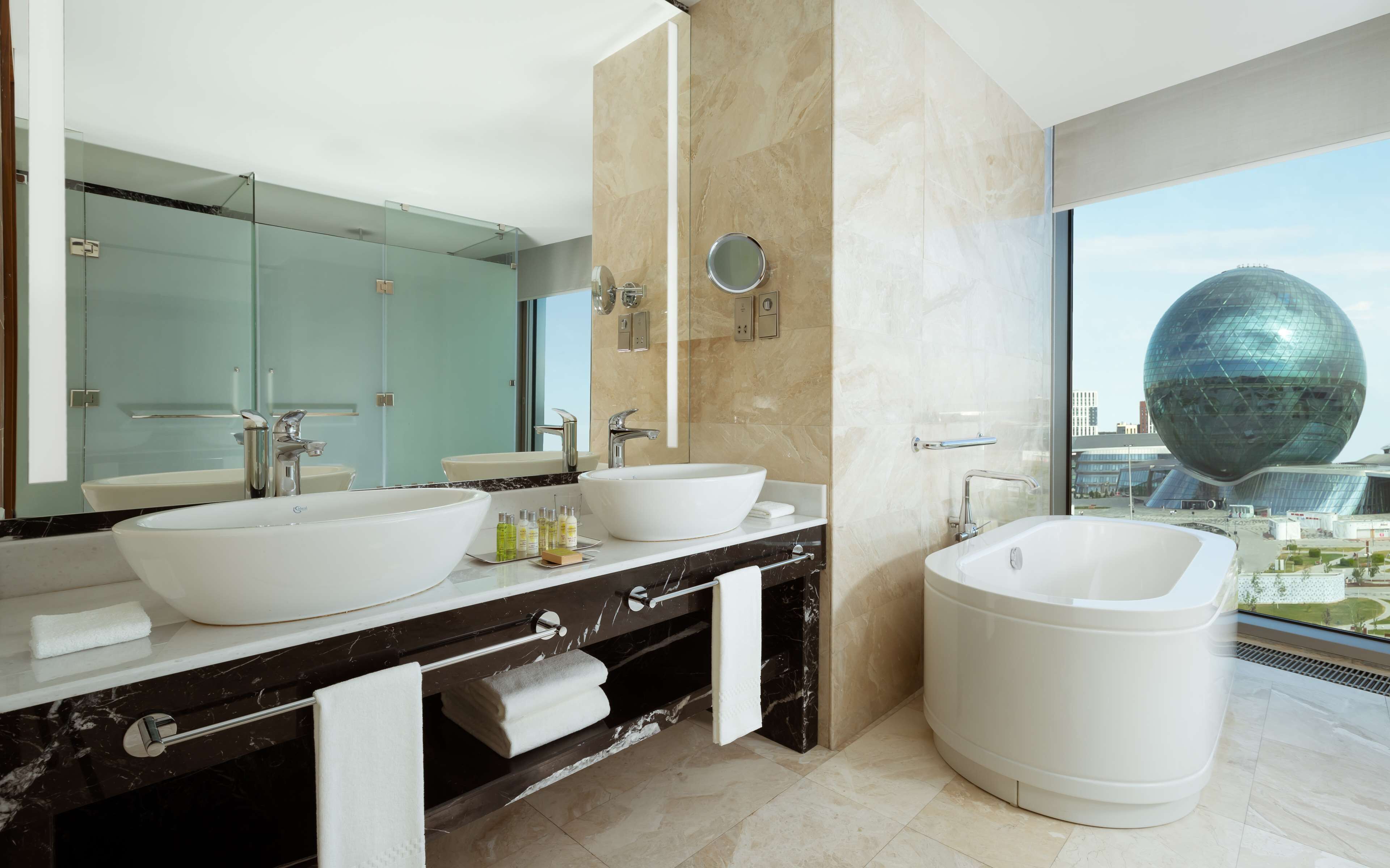 separate bathtub and shower, deep-soaking bathtub, rainfall showerhead