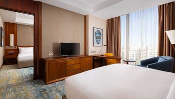 Premium bedding, memory foam beds, minibar, in-room safe