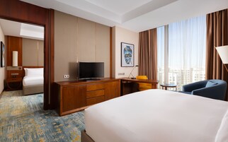 Premium bedding, memory foam beds, minibar, in-room safe