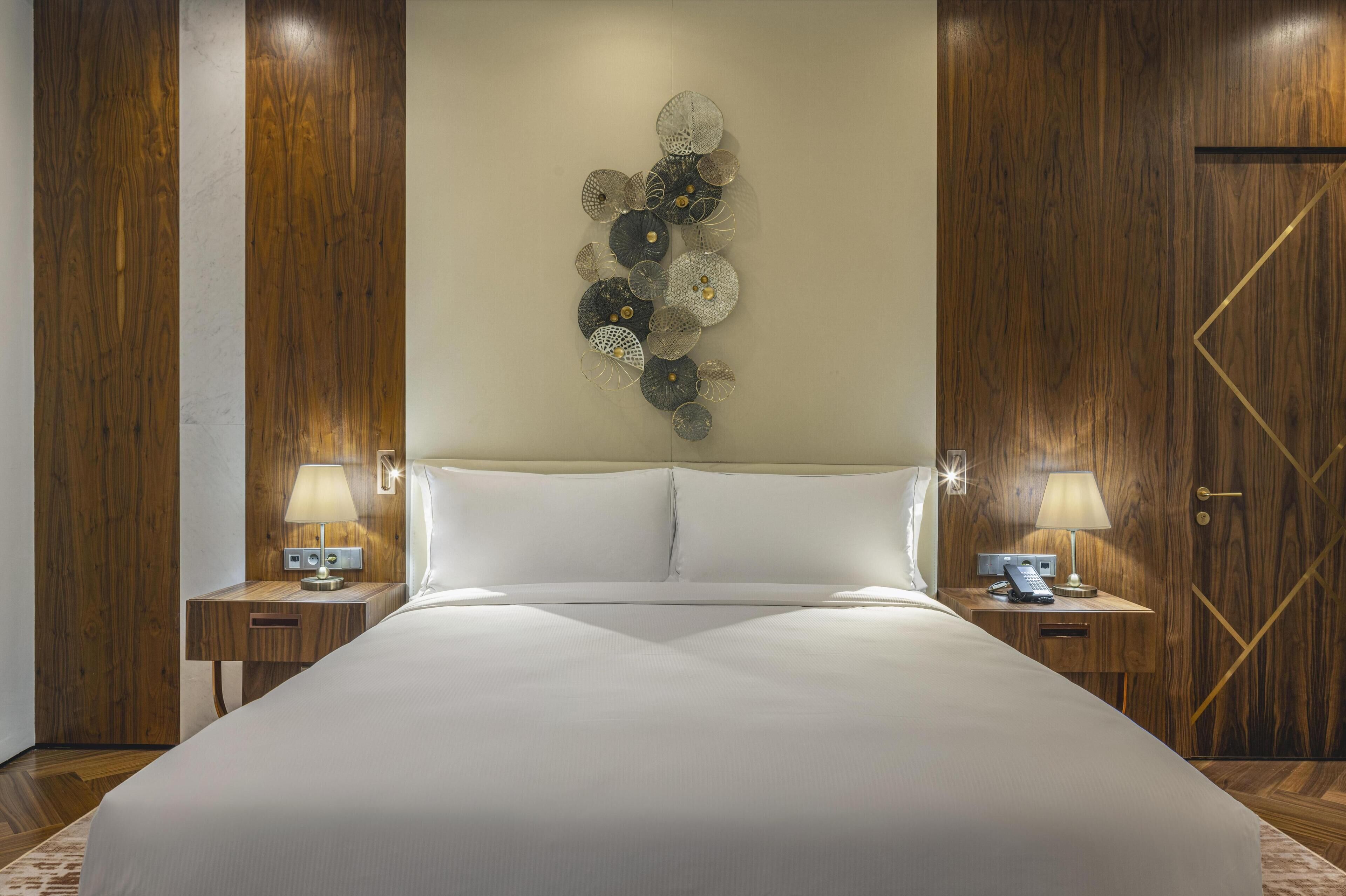 Premium bedding, memory foam beds, minibar, in-room safe