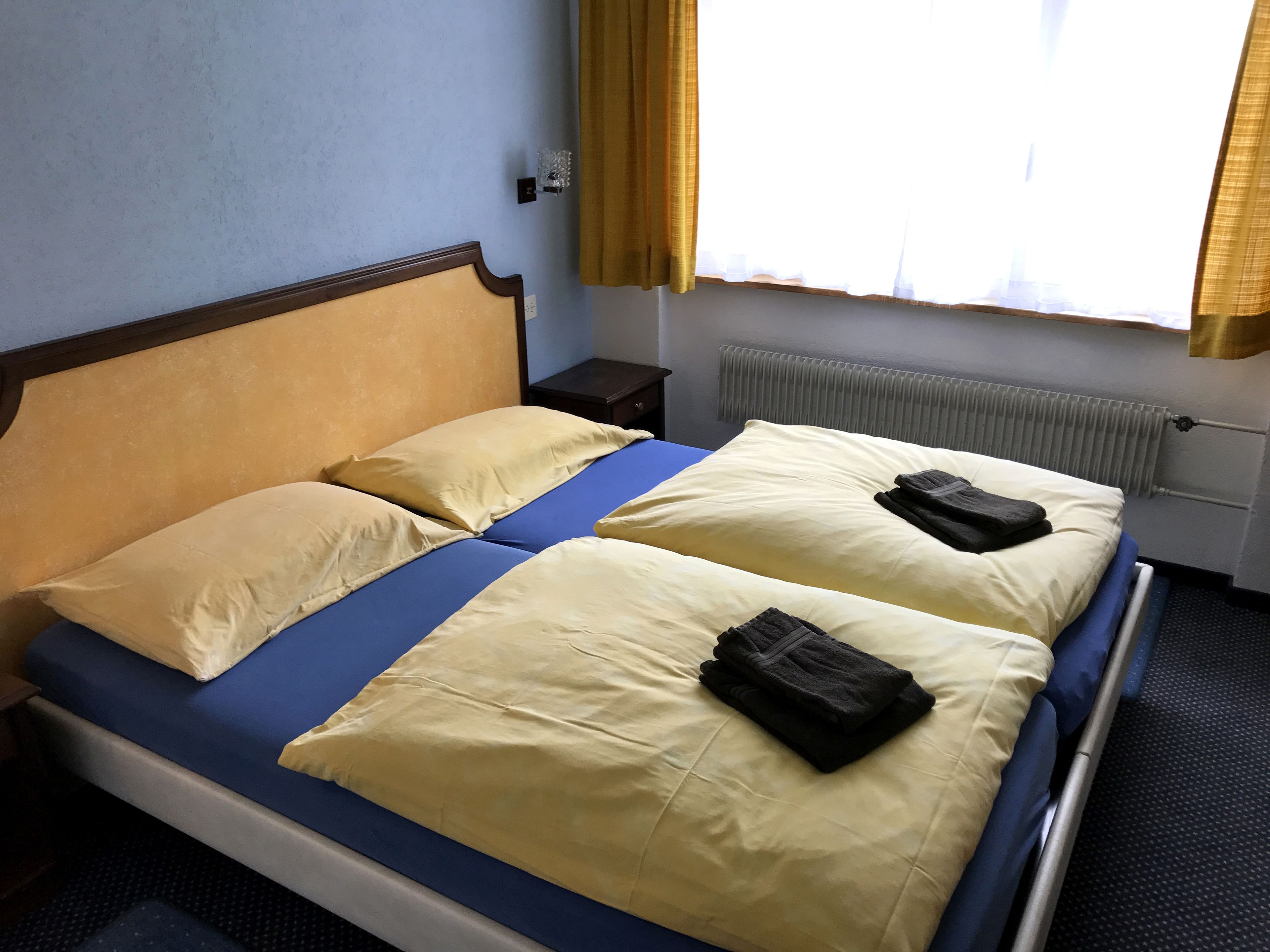 economy double room, garden view | frette italian sheets, premium bedding, select comfort beds, minibar