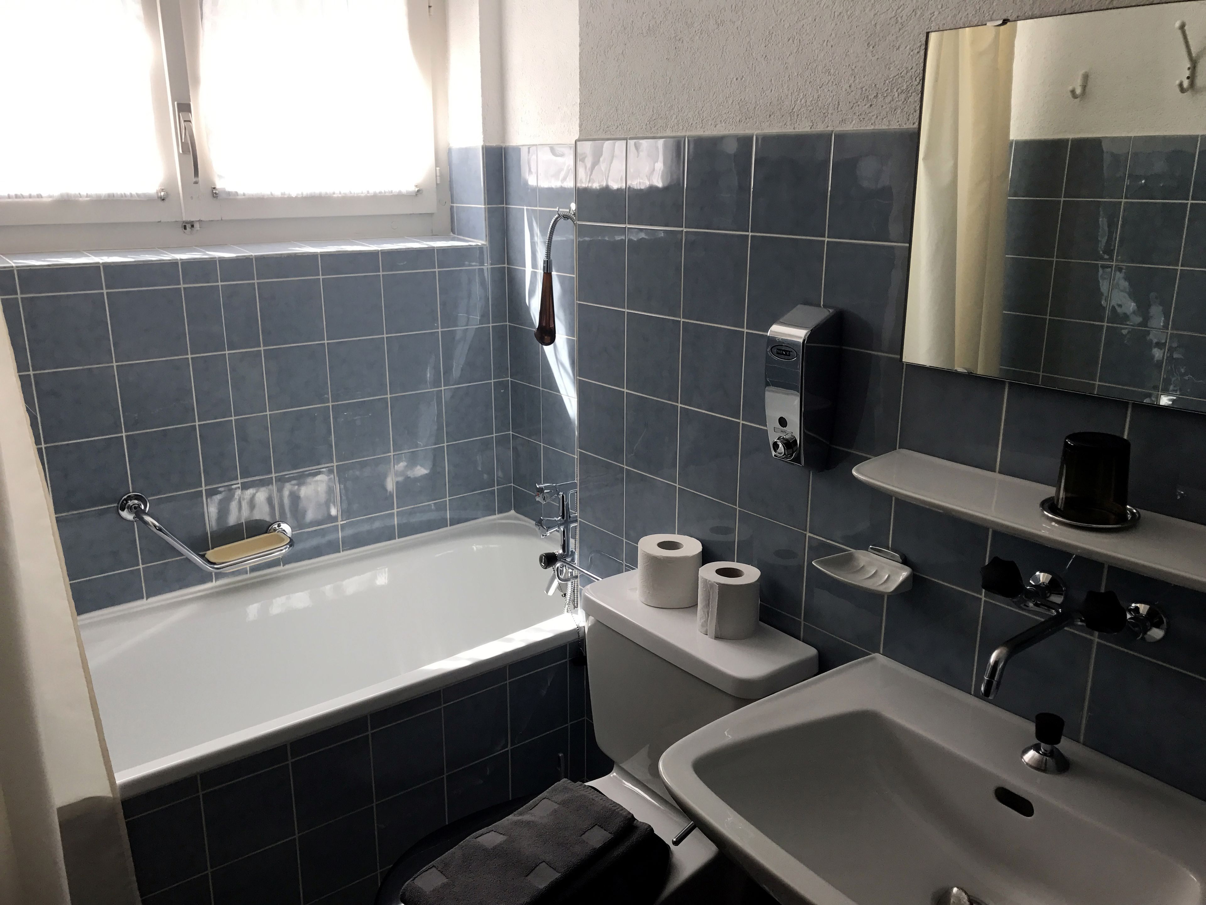 luxury double room, mountain view | bathroom | rainfall showerhead, eco-friendly toiletries, hair dryer, towels
