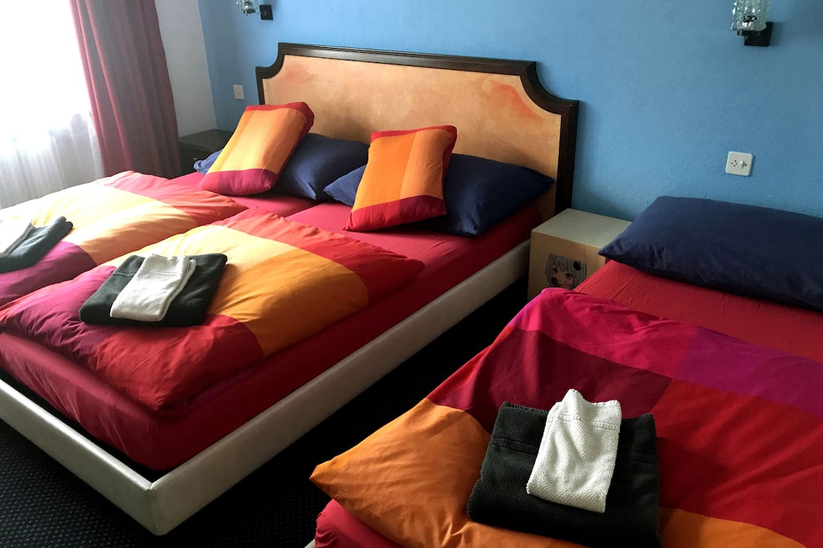 luxury triple room, mountain view | frette italian sheets, premium bedding, select comfort beds, minibar