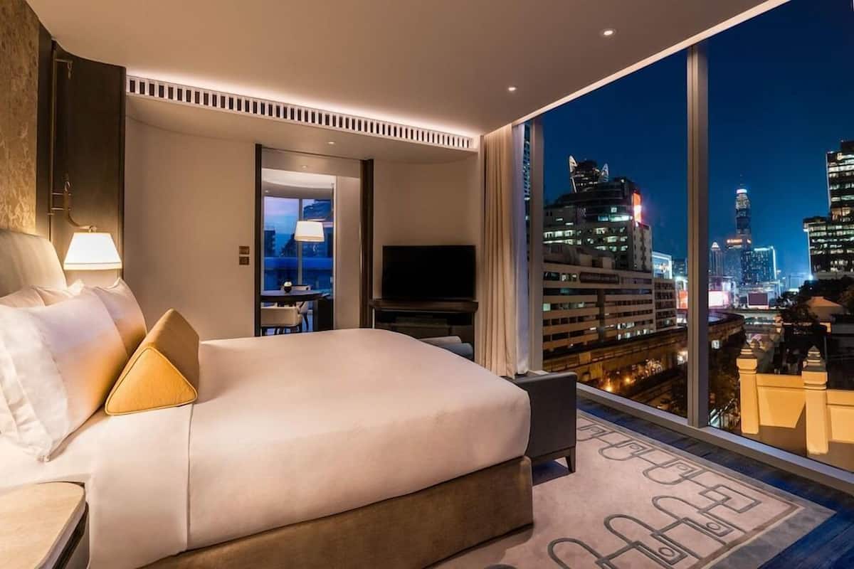 Luxe beddengoed, een minibar, een kluis op de kamer, een bureau