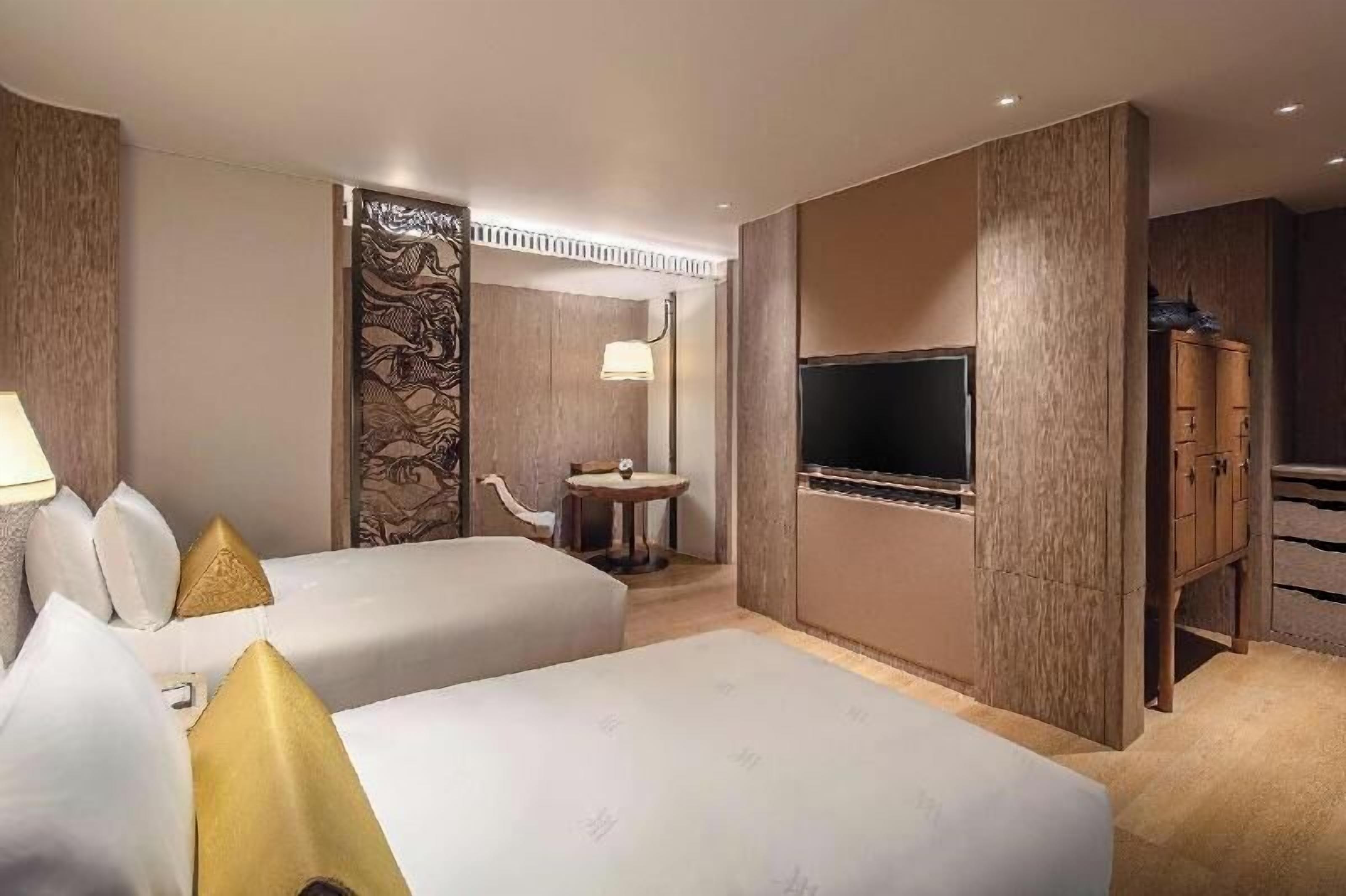 Ropa de cama de alta calidad, minibar, caja fuerte