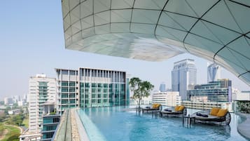 Outdoor pool, open 6:00 AM to 10:00 PM, free pool cabanas