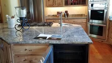 Presidential Studio Suite, 1 King Bed, Fireplace, River View | Shared kitchen | Coffee/tea maker
