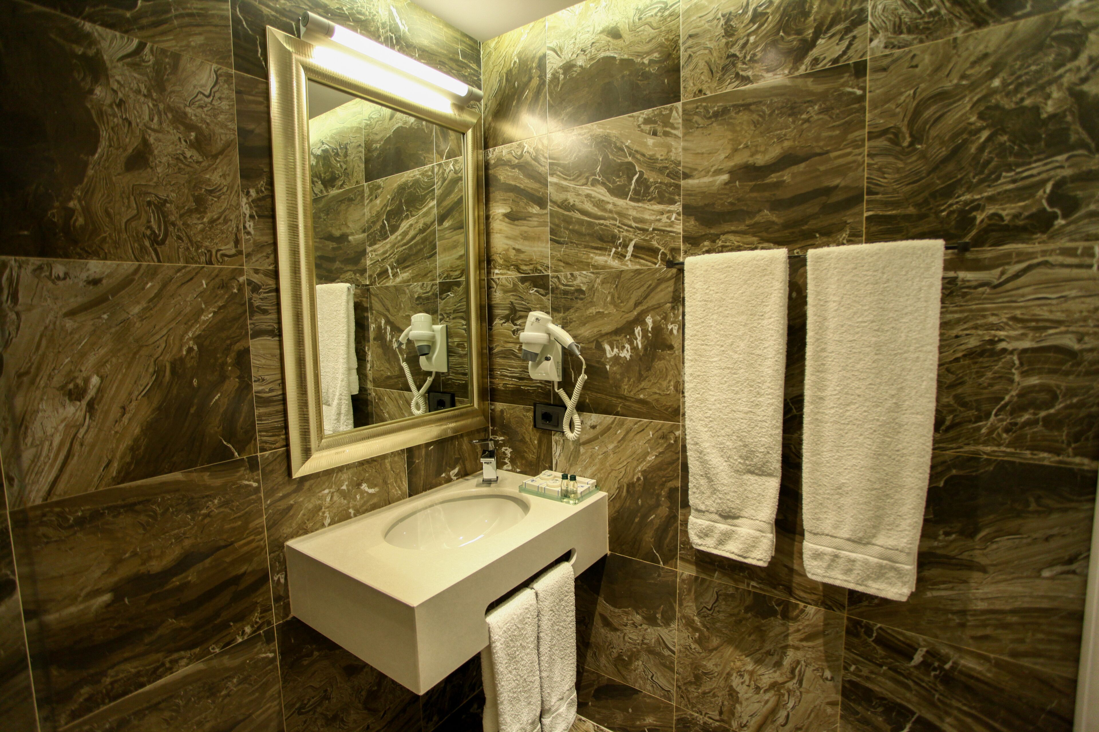 shower, free toiletries, hair dryer, slippers