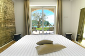 Suite Junior pianoterra  con Patio e vista Piscina | View from room - Cà Barbini Resort (Garda)