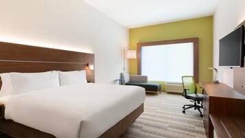 Colchones con pillow-top y caja de seguridad en la habitación