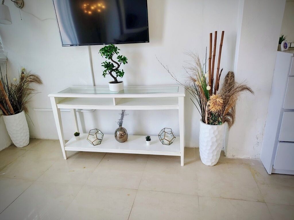 Large Studio, 1 King Bed S5 | Living area | 22-inch flat-screen TV with cable channels, TV, pay movies