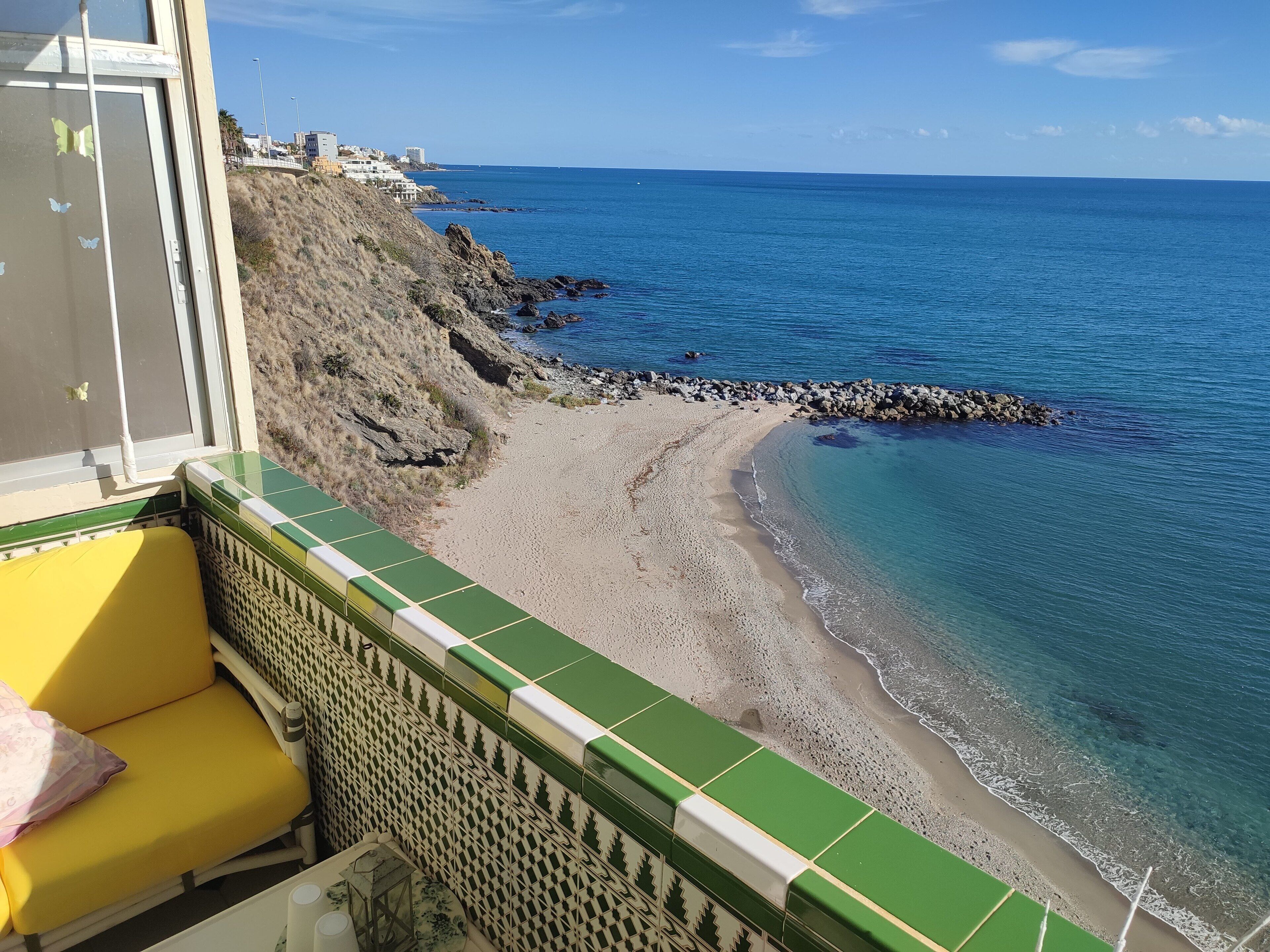 On the beach, sun-loungers, beach towels