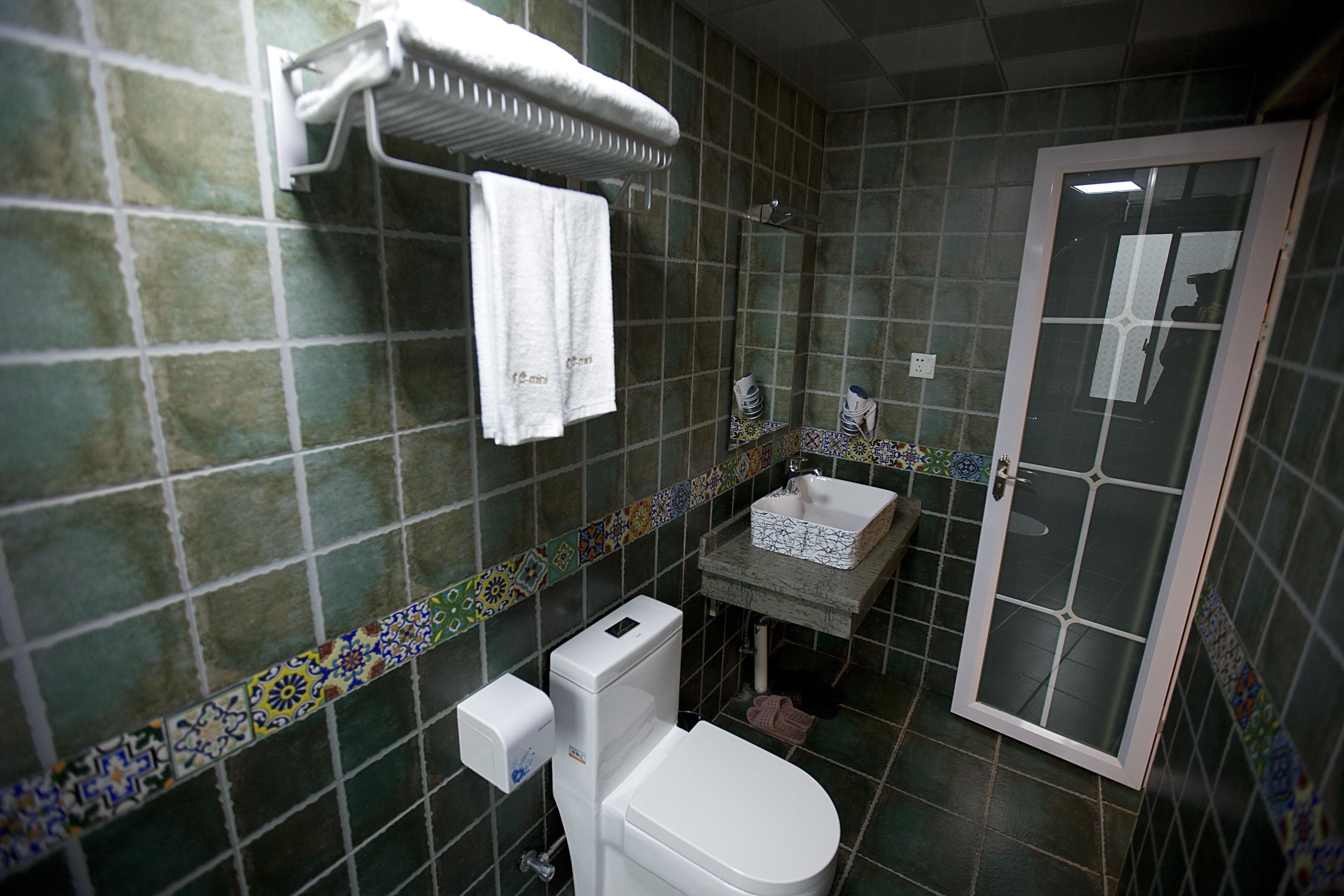 superior king room | bathroom | shower, free toiletries, hair dryer, slippers
