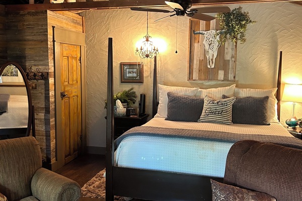 King poster bed, closet door to left