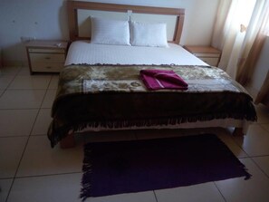 Villa | Ropa de cama de alta calidad y tabla de planchar con plancha 