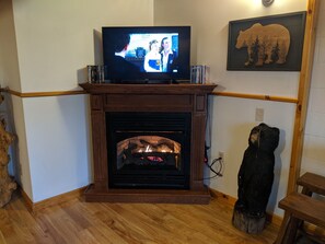 Rec room with gas fireplace, Foosball, arcade, 2nd TV and more carved bears! 