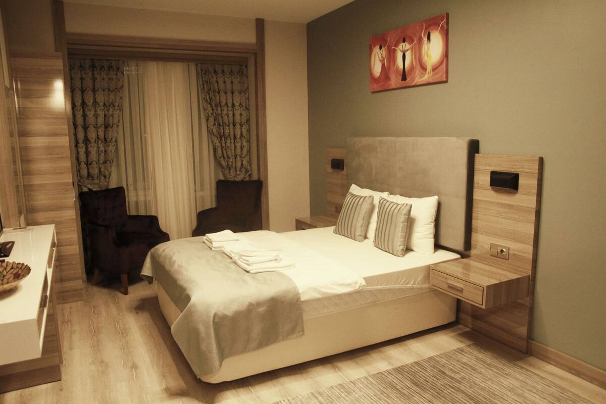 Suite studio Deluxe, 1 chambre, fumeur | Bureau, accès au Wi-Fi (inclus), literie fournie