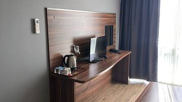 Suite, 1 Bedroom | Living area | LCD TV