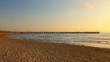 Massaggi sulla spiaggia, pesca