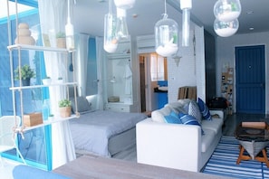 Zimmer, 1 Schlafzimmer | Wohnbereich | Flachbildfernseher