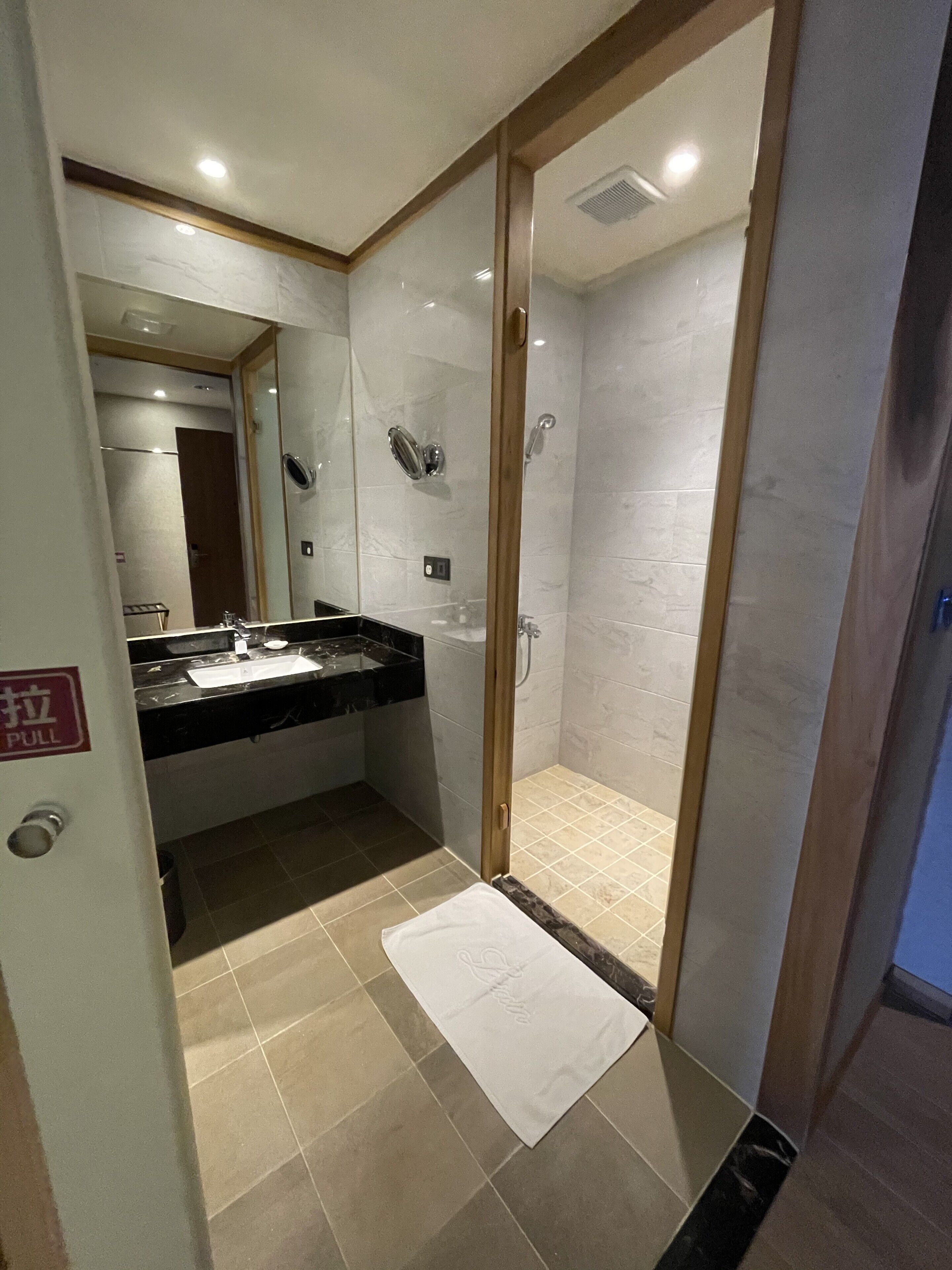 standard double room | bathroom | hair dryer, towels, shampoo, toilet paper