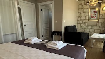 Suíte júnior | Roupas de cama premium, cofres nos quartos, quartos à prova de som