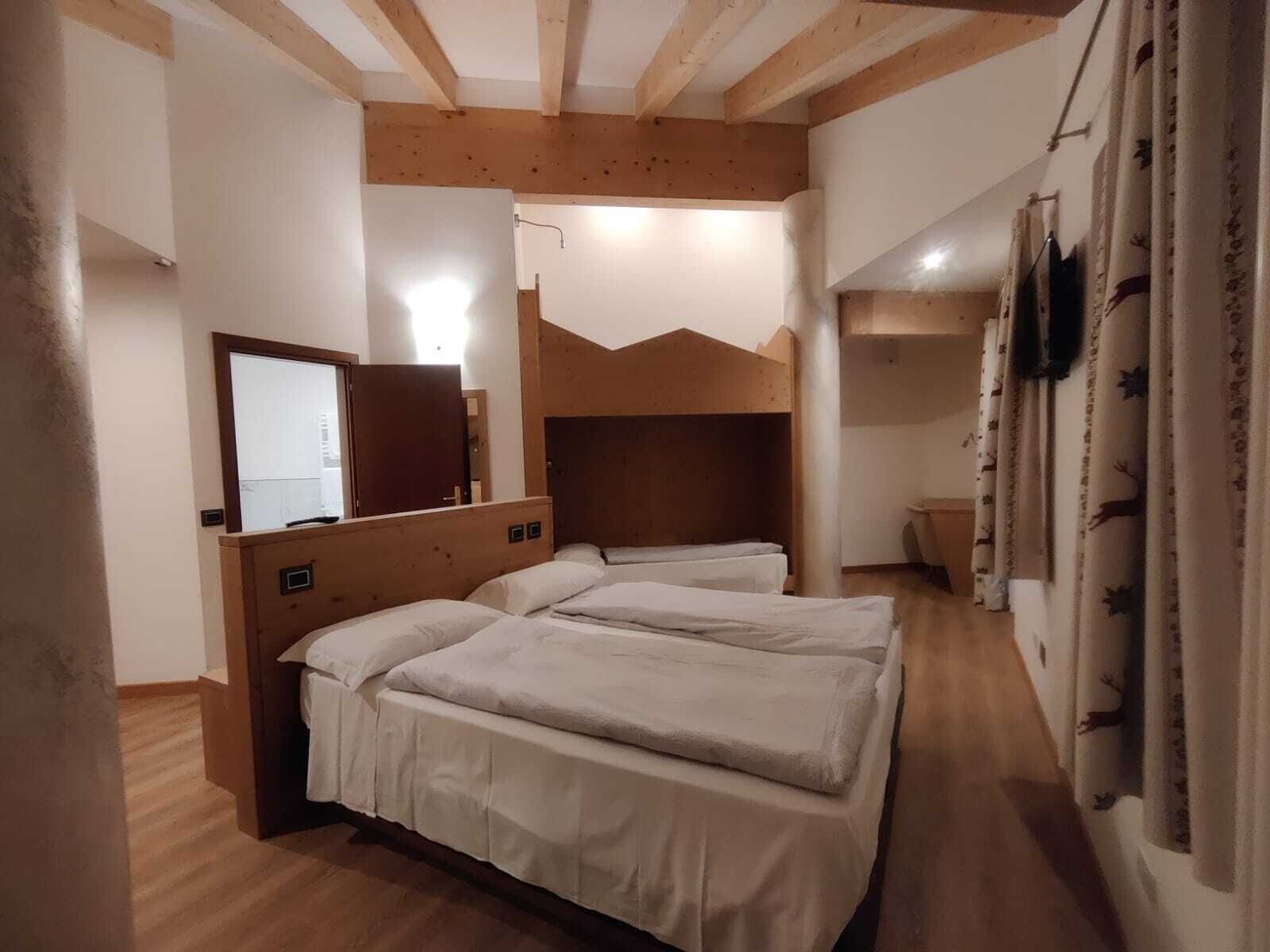 Superior Quadruple Room | Down duvets, in-room safe, desk, soundproofing