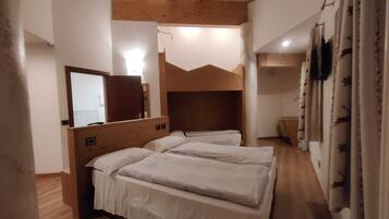 Superior Quadruple Room | Down duvets, in-room safe, desk, soundproofing