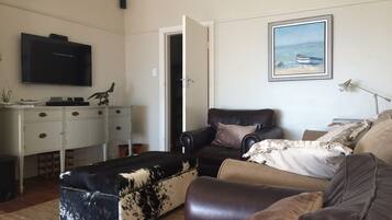 Luxury Villa, 3 Bedrooms, Ocean View, Beachfront | Living room | Flat-screen TV, fireplace