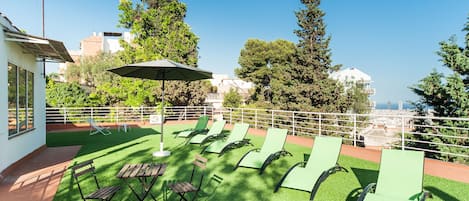 Family House, 4 Bedrooms | Living area | 30-inch flat-screen TV with digital channels, TV