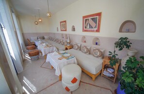 Breakfast, lunch, dinner served; local cuisine 