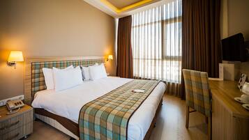 Chambre Standard | Literie de qualité supérieure, minibar, coffres-forts dans les chambres