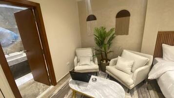 Habitación Elite con 1 cama matrimonial o 2 individuales | 1 habitación, minibar y caja de seguridad en la habitación