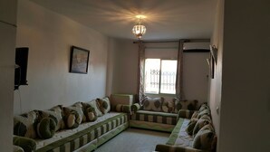 Appartement Familial, 2 chambres, vue ville | Coin séjour
