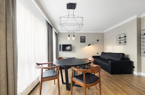 Apartment (Victoria Residence 10) | Living room | Flat-screen TV